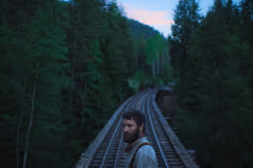 In Review: ‘Train Dreams,’ ‘Predator: Badlands,’ ‘Peter Hujar's Day’